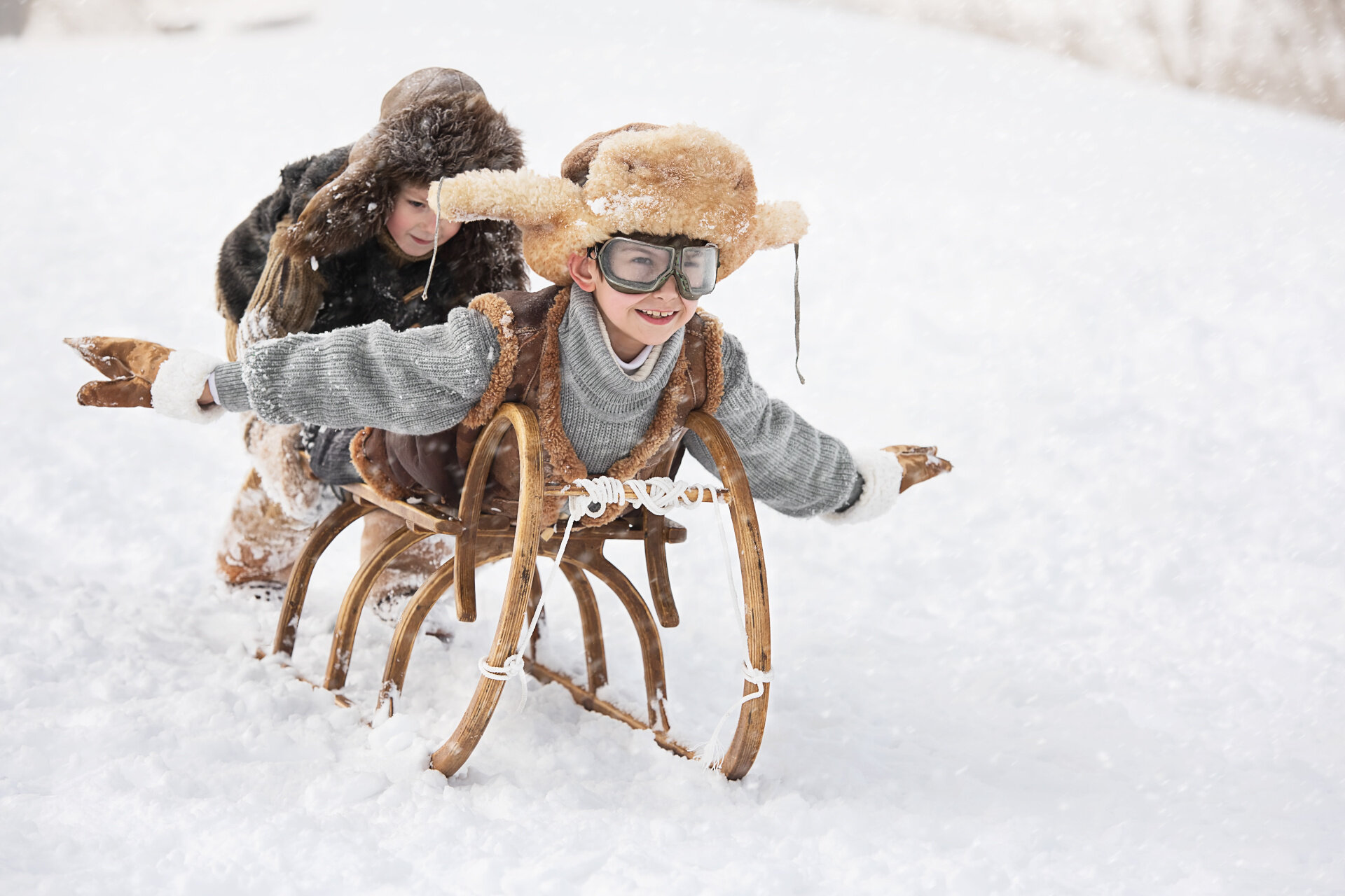 Bambini mentre si divertono sullo slittino | © Archivio Immagini ApT Val di Fassa