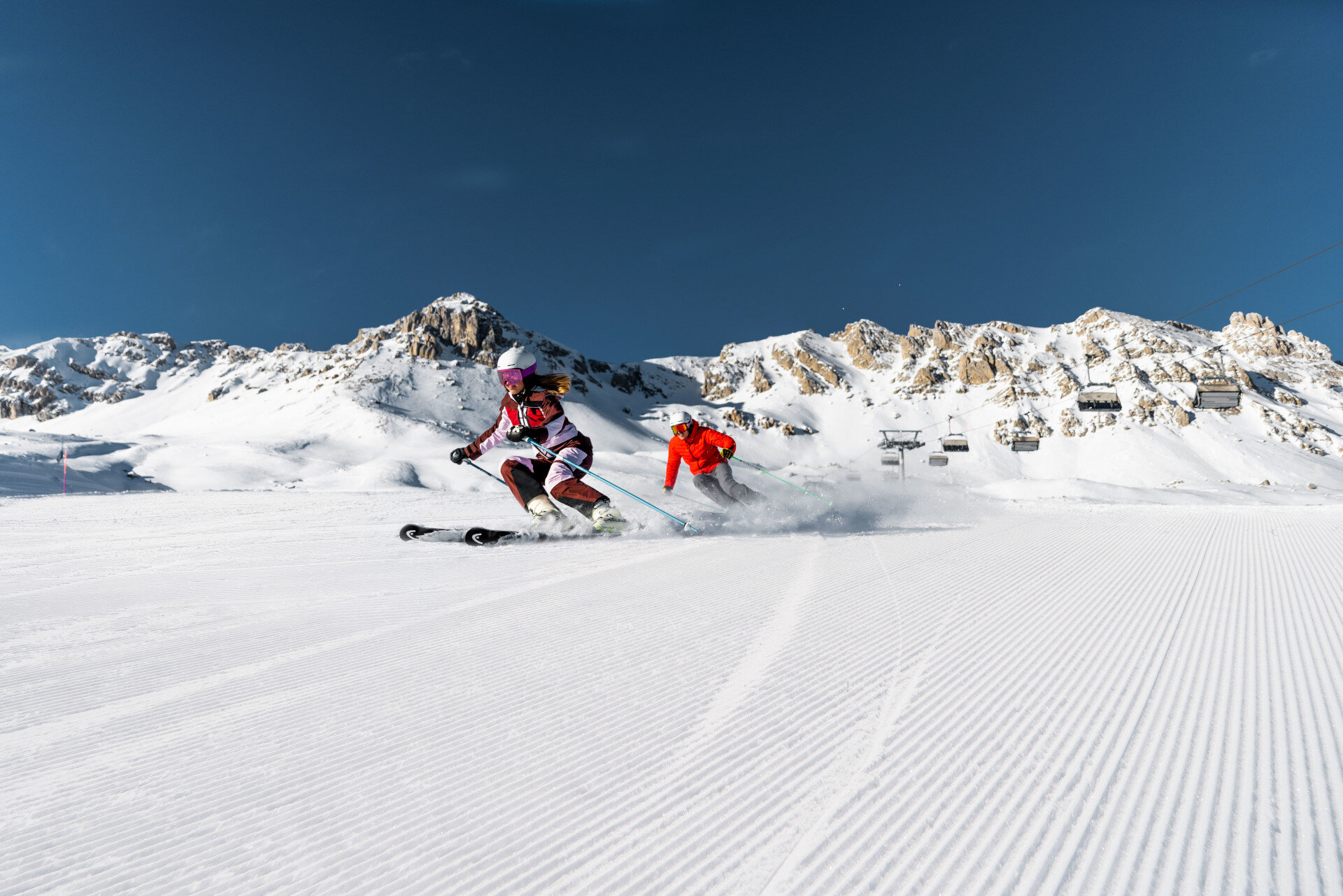 Coppia di sciatori sulle piste della Skiarea Alpe Lusia - San Pellegrino | © Federico Modica - Archivio Immagini ApT Val di Fassa