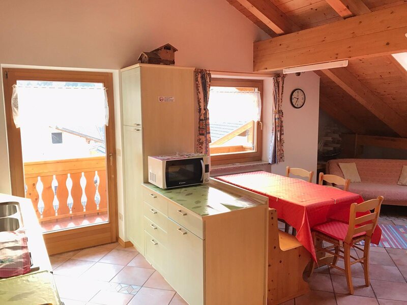 Bright living room with dining table